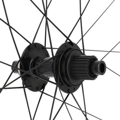 Roue VTT 27.5" Arrière Shimano K7 Jante Noir Moyeu SH MT620 Centerlock 12V Micro Spline Axe Travers. Boost 12x148