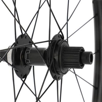 Roue VTT 27.5" Arrière Shimano K7 Jante Noir MT620 Centerlock 12V Micro Spline Axe Travers. Boost